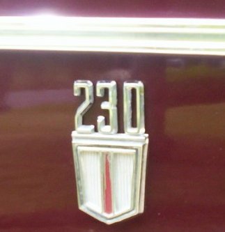 230 L6 fender emblem